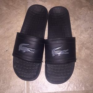Black Lacoste slides
